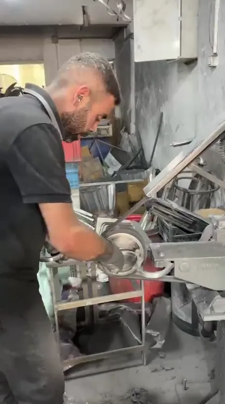 Polishing a Metal Candelabra Arm Polishing a Metal Candelabra Arm